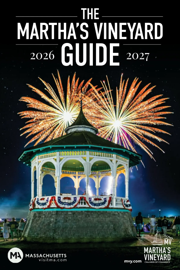A white gazebo decorated with patriotic bunting stands in a park at night, while colorful fireworks burst in the sky above—capturing the spirit of Martha's Vineyard. Text reads, “The Martha’s Vineyard Guide 2026–2027.” Logos appear at the bottom.