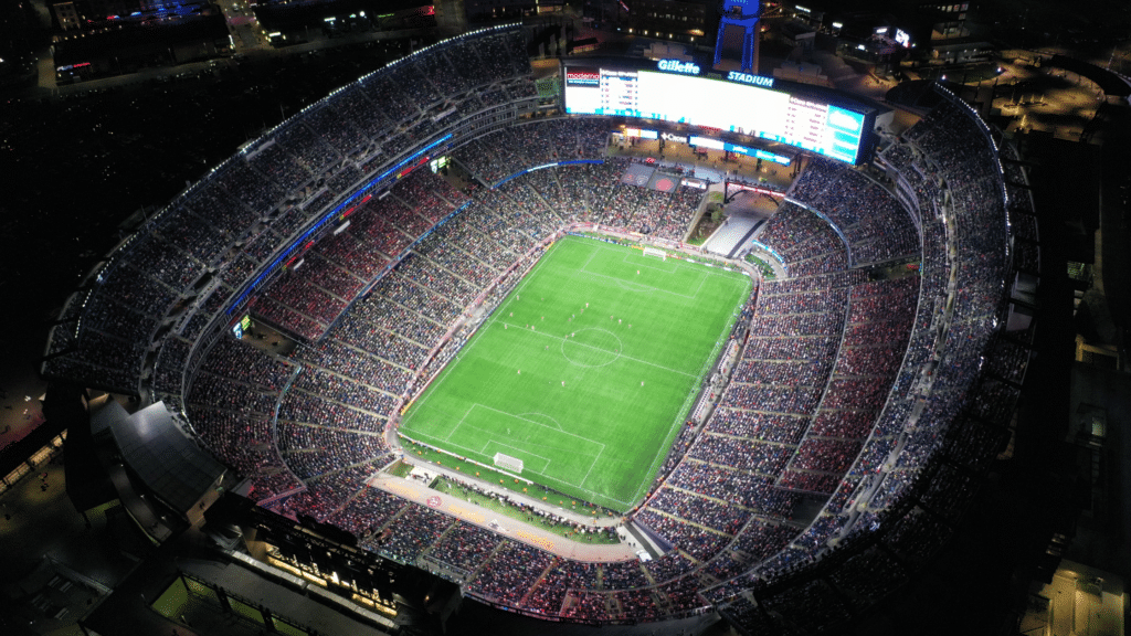 Thousands of spectators watch a soccer game at Gillette Stadium in Foxboro, Massachusetts.