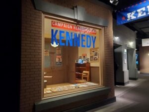 The opening exhibit in the John F. Kennedy Presidential Library and Museum in Boston, Massachusetts, focusing on the presidential campaign of 1960 and designed to look like a city street.