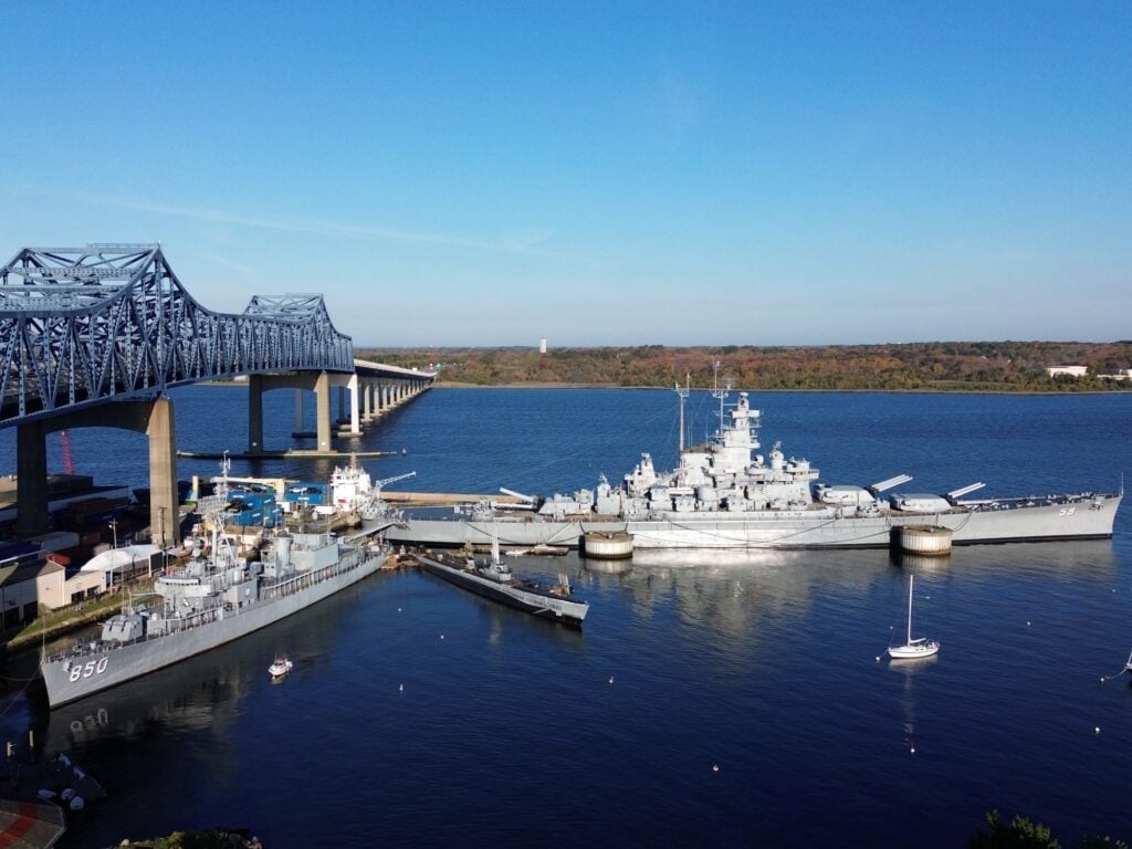 Two battleships in the harbor at Battleship Cove.