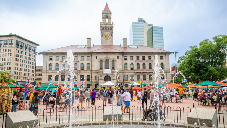 A crowd celebrates in front of Worcester Town Hall in Downtown Worcester. Credit: Erb/Dufault Photography