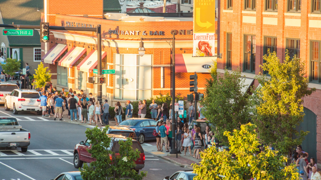 People gather on Shrewsbury Street in Worcester, Massachusetts